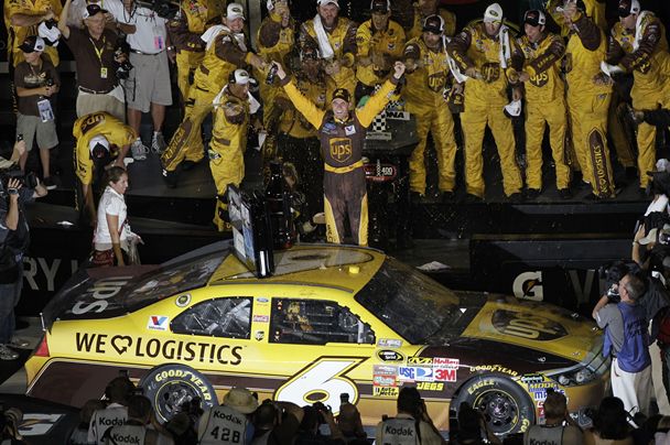 David Ragan, driver of the #6 UPS Ford, celebrates after winning the NASCAR Sprint Cup Series Coke ZERO 400 Powered by Coca-Cola at Daytona International Speedway on July 2, 2011 in Daytona Beach, Florida. (Photo by Chris Graythen/Getty Images)